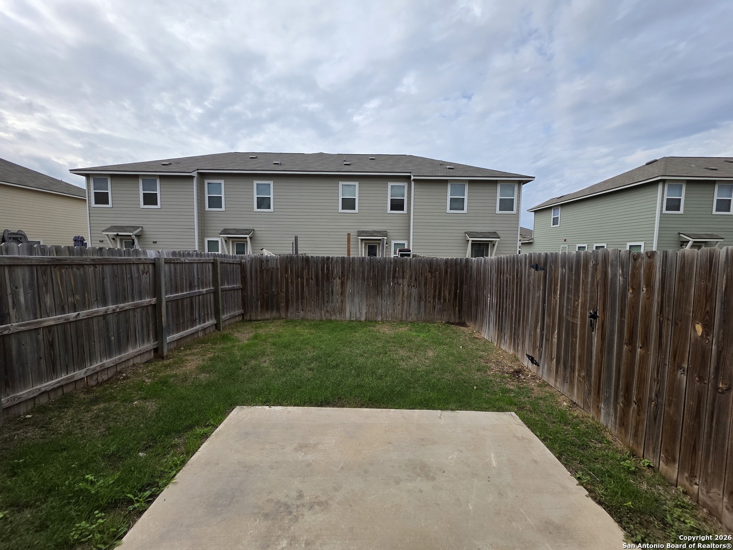 16909 Dancing Ava, Unit 2 Selma, TX 78154 - Photo 22 of 22 a view of house with backyard and garden