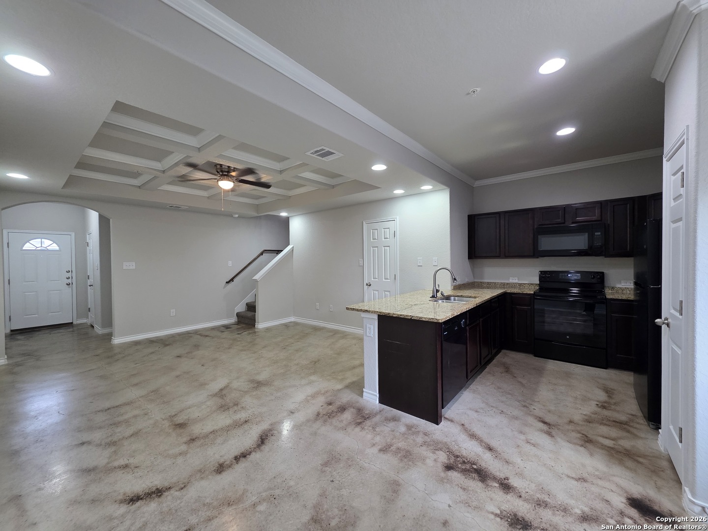 16909 Dancing Ava, Unit 2 Selma, TX 78154 - Photo 3 of 22 a kitchen with kitchen island a sink and a counter top space