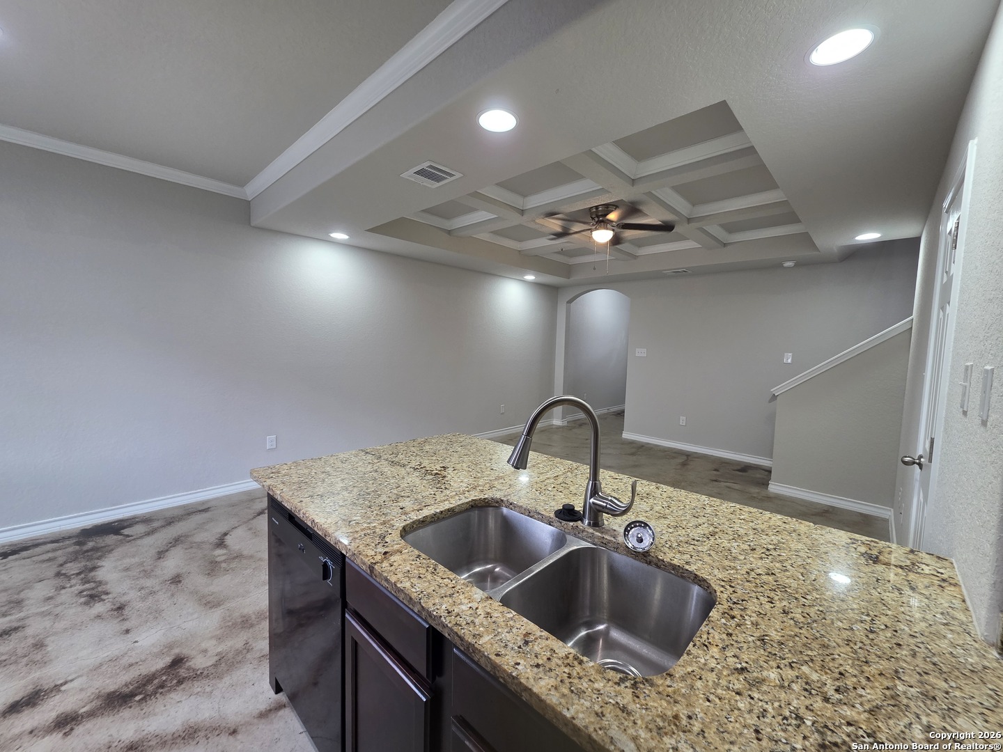 16909 Dancing Ava, Unit 2 Selma, TX 78154 - Photo 4 of 22 a kitchen with a sink a counter space and a chandelier
