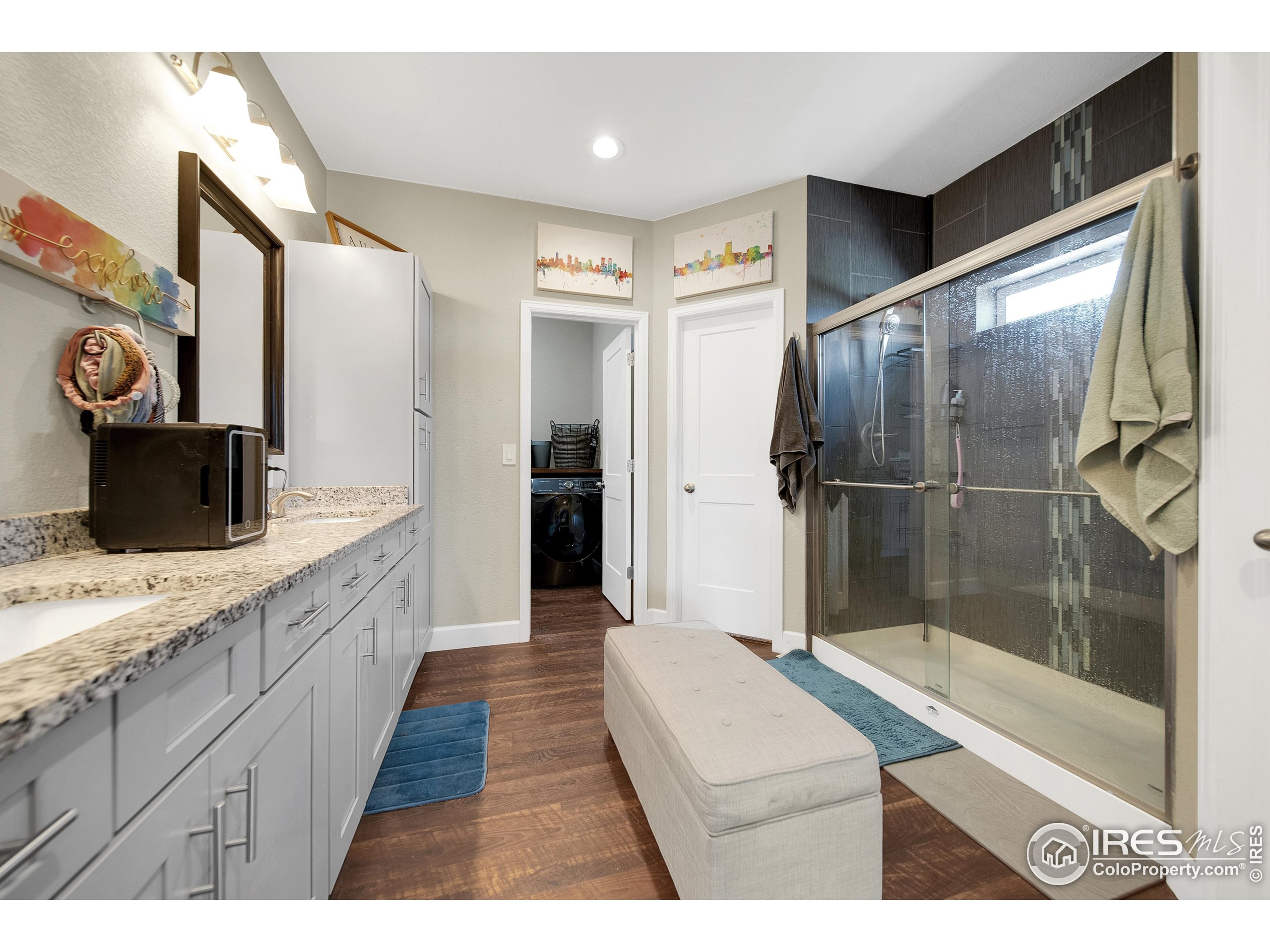 7566 County Road Wiggins, CO 80654 - Photo 13 of 23 a bathroom with a sink a toilet and shower