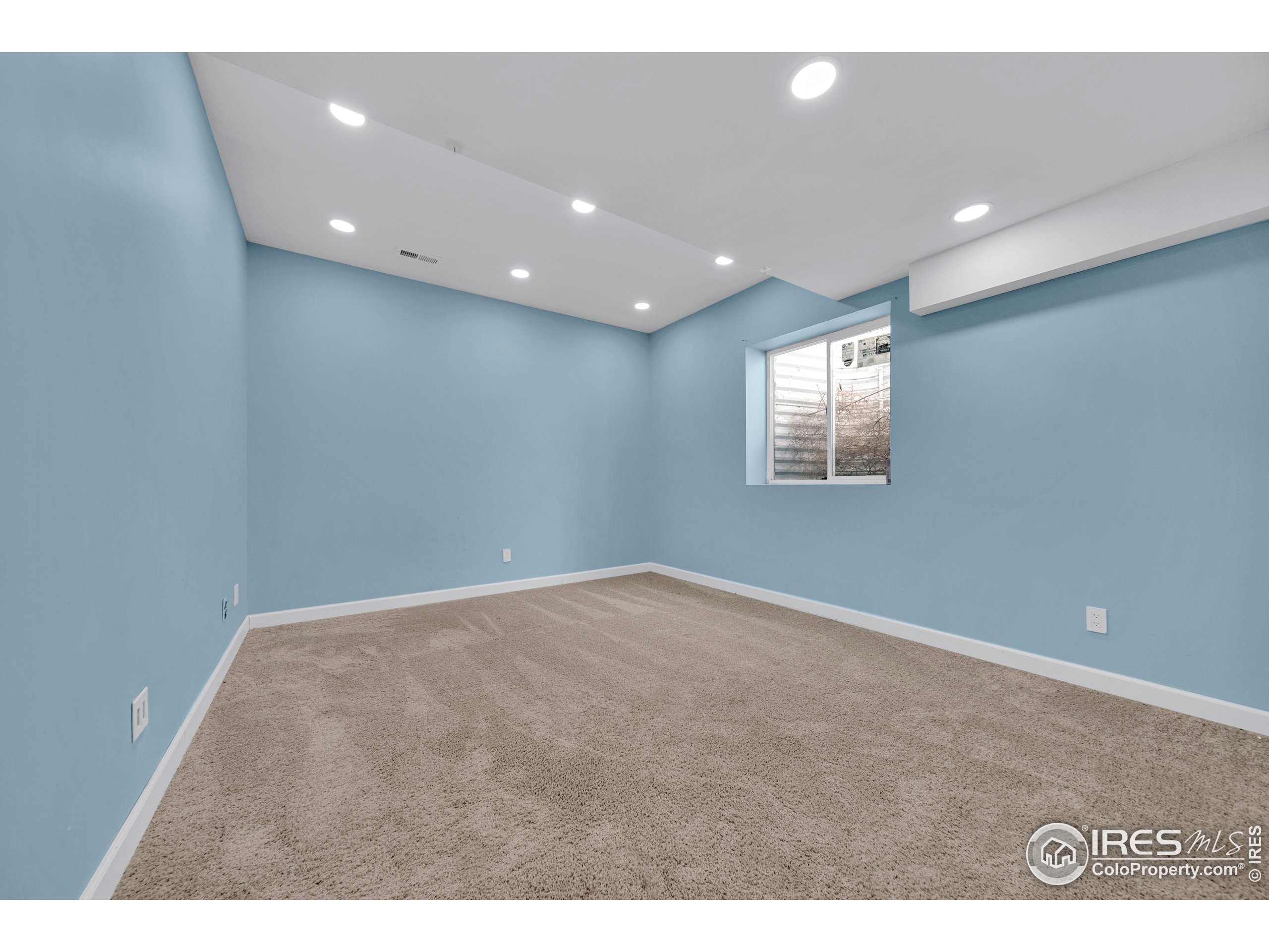 7566 County Road Wiggins, CO 80654 - Photo 18 of 23 a view of an empty room with a window