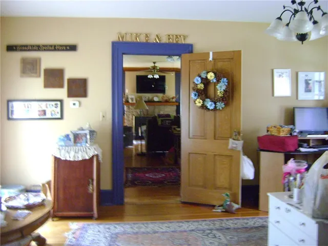 a bedroom with a bed and a lamp