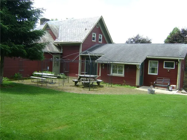 a view of a back yard with green space
