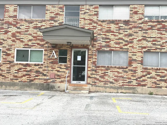 a car parked in front of a house