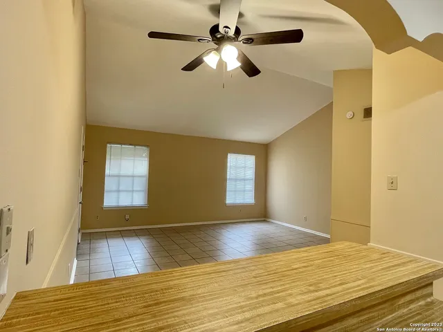 a view of an empty room and window