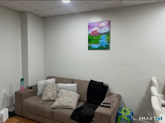 a view of kitchen island with wooden floor