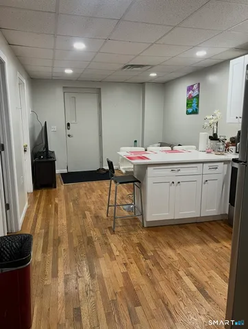 a living room with furniture and a couch