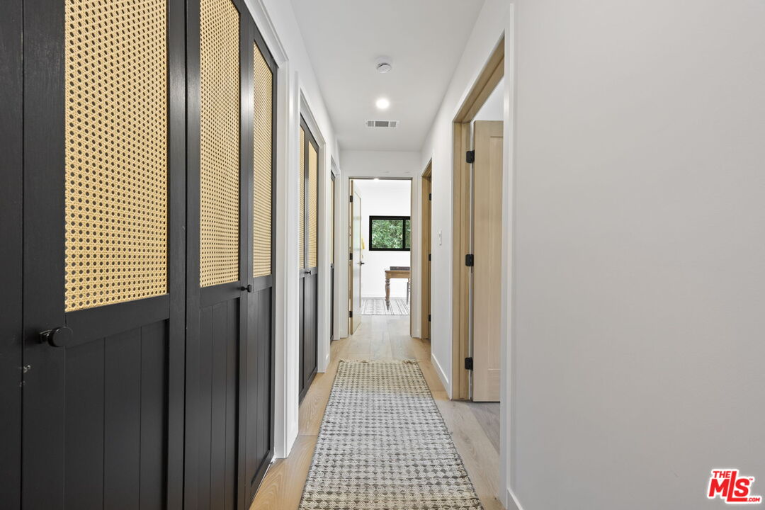 1131 Rancho Drive Ojai, CA 93023 - Photo 49 of 58 a view of a hallway with a bathroom
