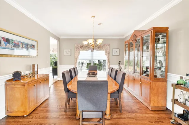 a view of a living room with furniture and a window
