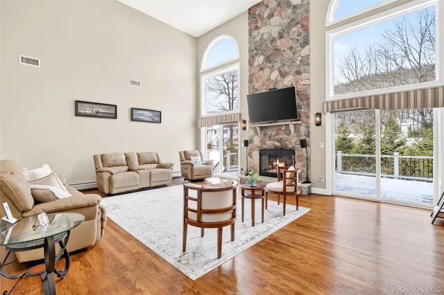 a kitchen with stainless steel appliances kitchen island granite countertop a sink and cabinets