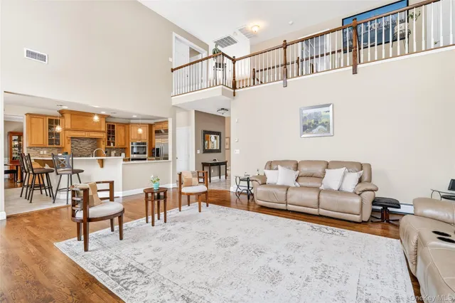 a kitchen with granite countertop stainless steel appliances and cabinets