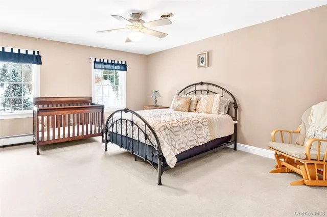 a bathroom with a sink double vanity and a mirror
