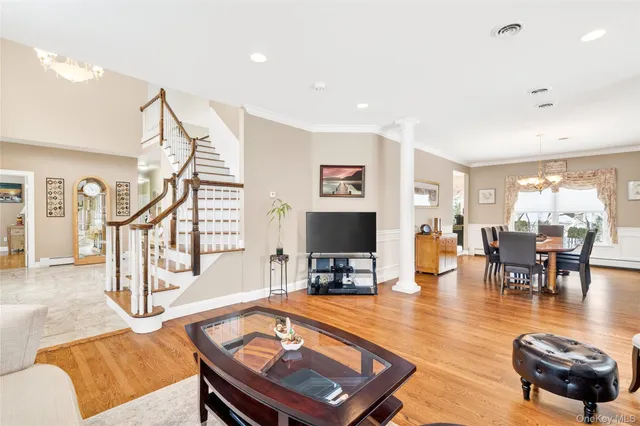 a living room with furniture and a table