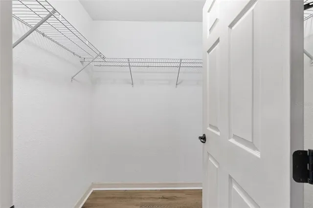 a view of small space with racks on the wall