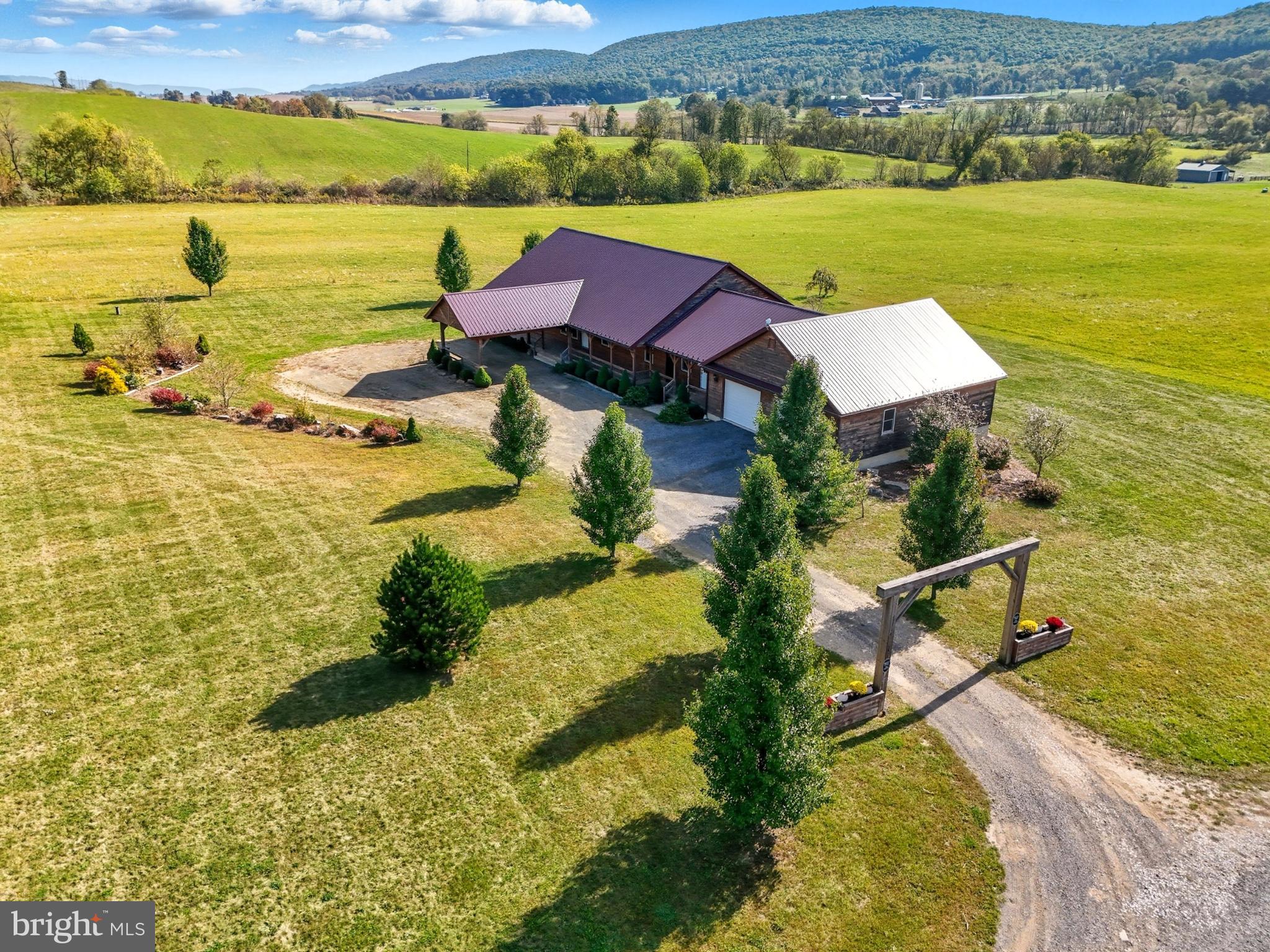 107 Linkin Park Drive Spring Mills, PA 16875 - Photo 1 of 66 a view of a city with an ocean view