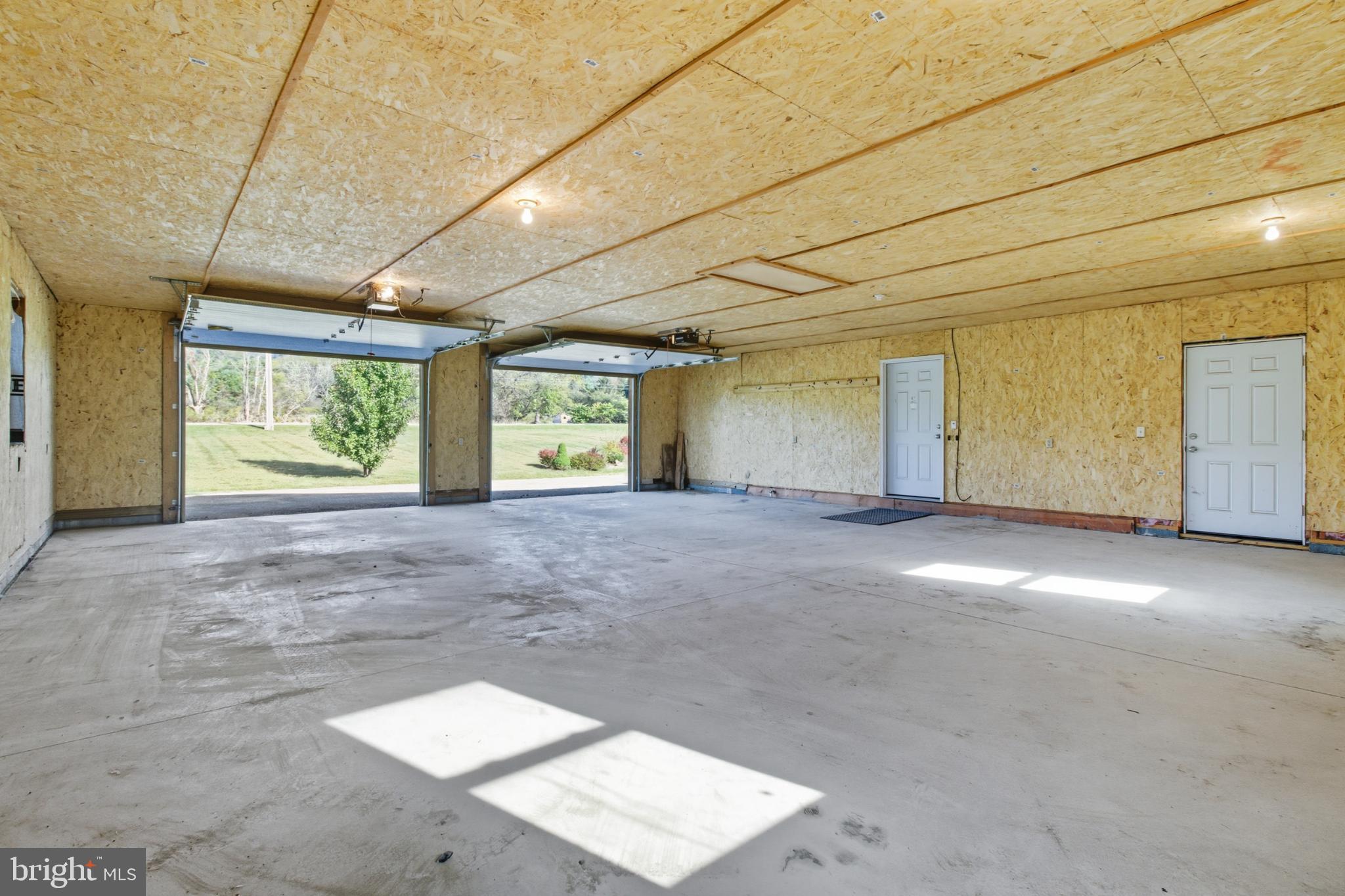 107 Linkin Park Drive Spring Mills, PA 16875 - Photo 13 of 66 a view of an empty room with a window