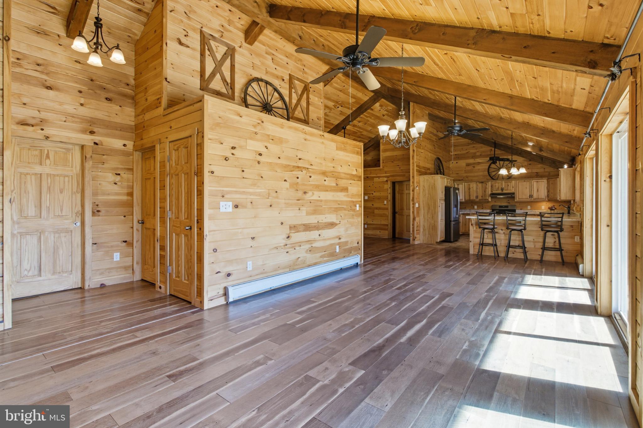 107 Linkin Park Drive Spring Mills, PA 16875 - Photo 28 of 66 a view of a hallway with wooden floor