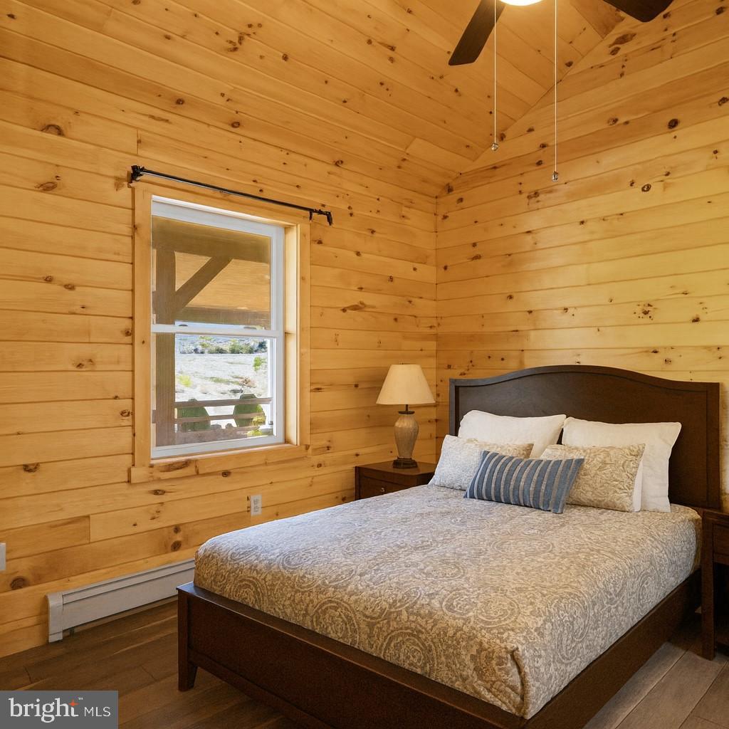 107 Linkin Park Drive Spring Mills, PA 16875 - Photo 33 of 66 a bedroom with a bed and a window