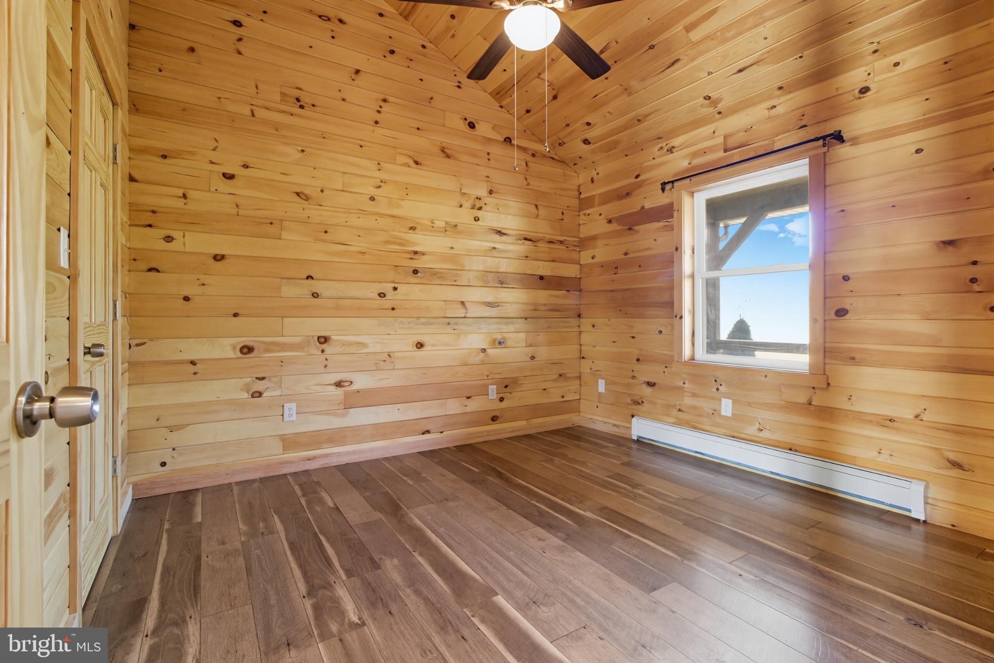107 Linkin Park Drive Spring Mills, PA 16875 - Photo 35 of 66 a view of a ceiling fan and wooden floor