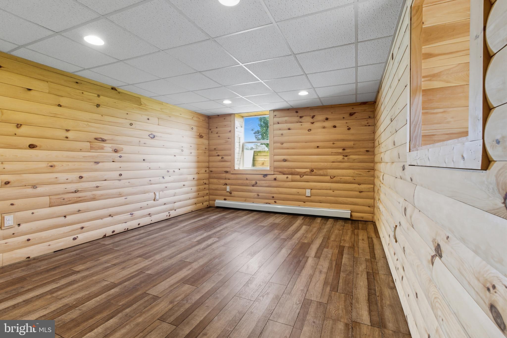 107 Linkin Park Drive Spring Mills, PA 16875 - Photo 56 of 66 a view of walk in closet with wooden floor and a bathroom