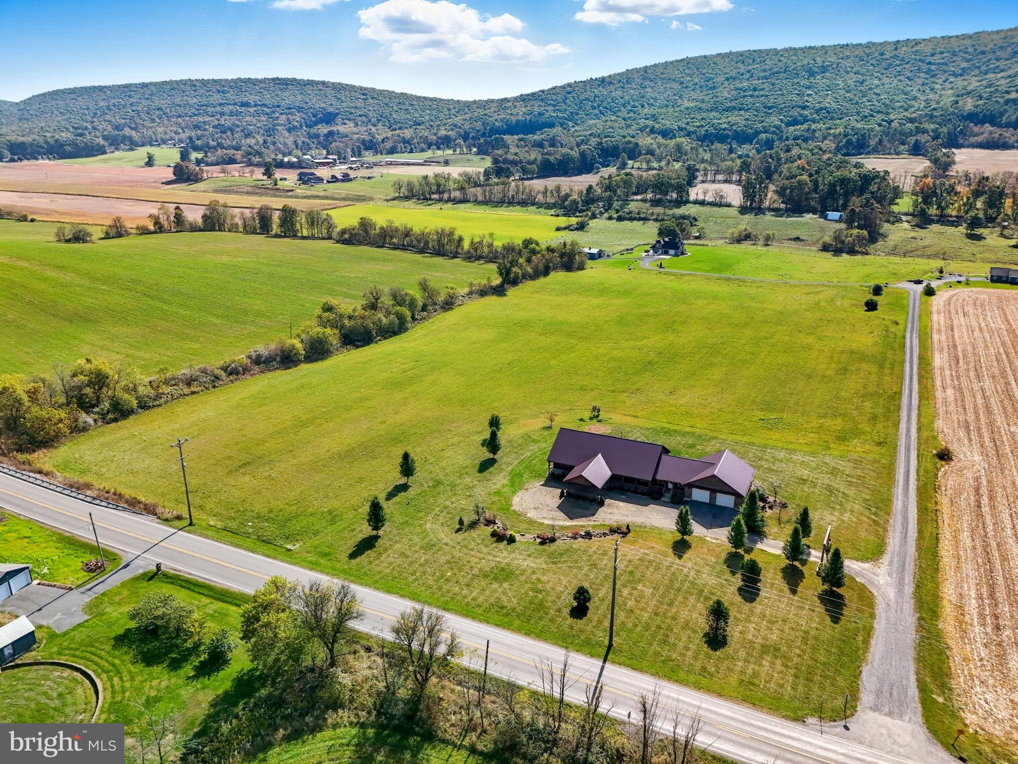 107 Linkin Park Drive Spring Mills, PA 16875 - Photo 66 of 66 a view of a city and an ocean view