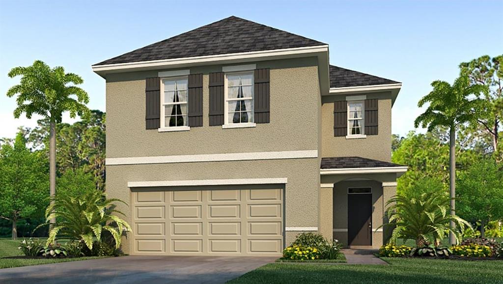 2771 Common Fig Run Wesley Chapel, FL 33543 - Photo 1 of 1 a front view of a house with garden