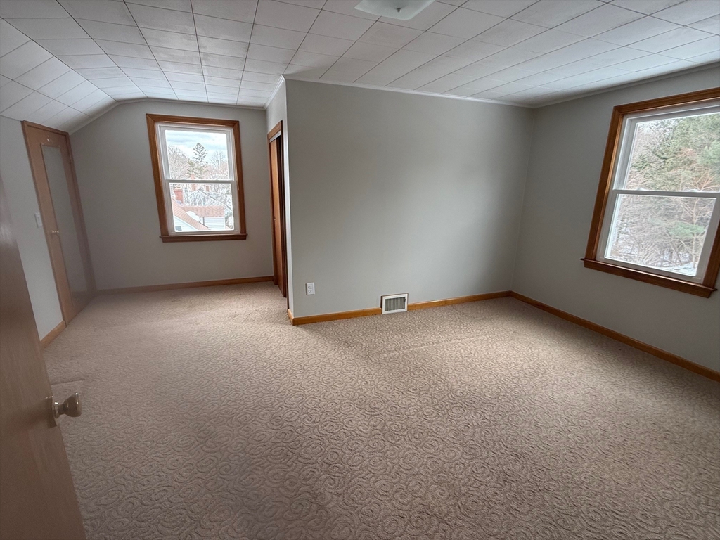 970 Trapelo Road Waltham, MA 02452 - Photo 12 of 25 an empty room with windows