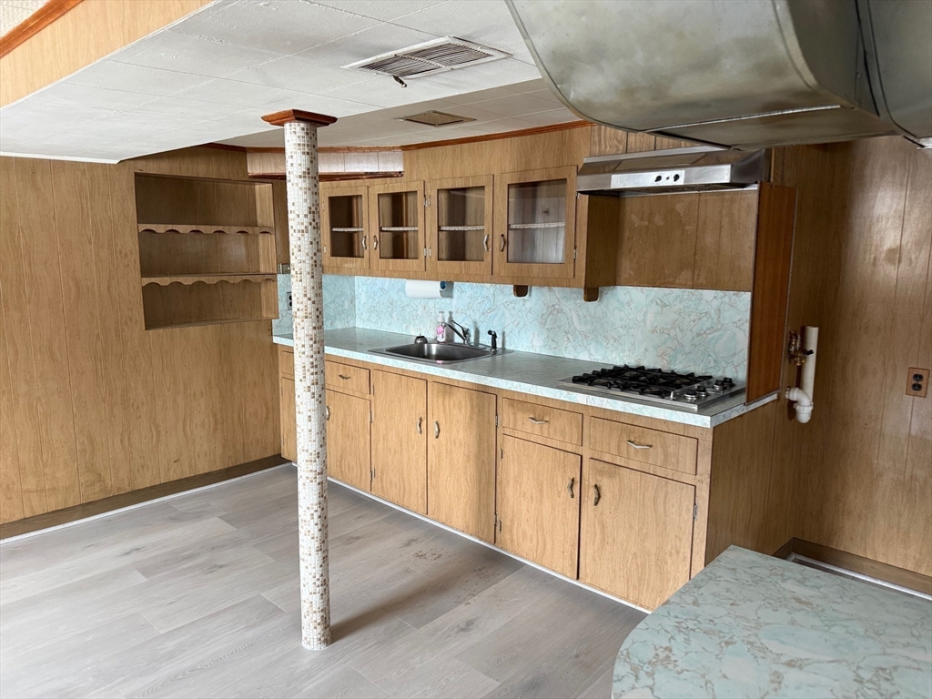 970 Trapelo Road Waltham, MA 02452 - Photo 19 of 25 a spacious bathroom with a granite countertop sink and a mirror