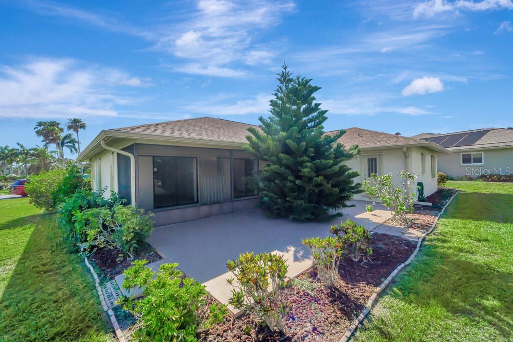 5861 Adams Road Venice, FL 34293 - Photo 40 of 51 Open Patio beyond the Lanai