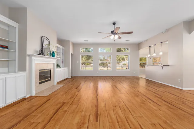 a view of an empty room with a window