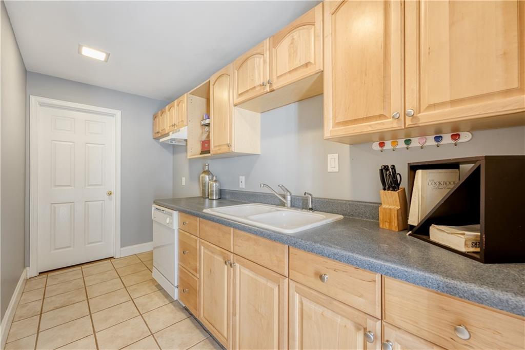 14124 Hopewell Road Alpharetta, GA 30004 - Photo 18 of 31 a bathroom with a sink and a mirror