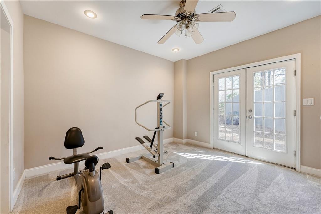 14124 Hopewell Road Alpharetta, GA 30004 - Photo 19 of 31 a view of a room with gym equipment