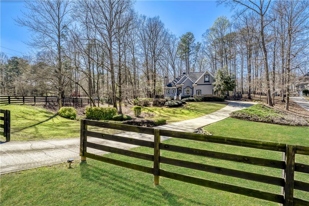 14124 Hopewell Road Alpharetta, GA 30004 - Photo 21 of 31 a view of a park with large trees