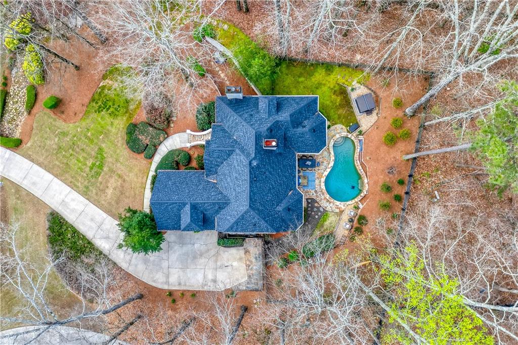 14124 Hopewell Road Alpharetta, GA 30004 - Photo 27 of 31 an aerial view of a house with a yard and a large tree