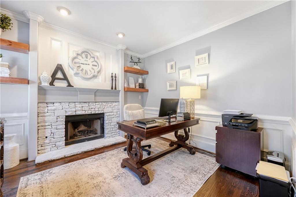 14124 Hopewell Road Alpharetta, GA 30004 - Photo 6 of 31 a living room with furniture and a fireplace