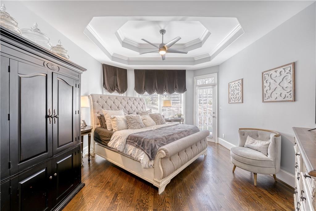 14124 Hopewell Road Alpharetta, GA 30004 - Photo 9 of 31 a bedroom with a bed couch and a window