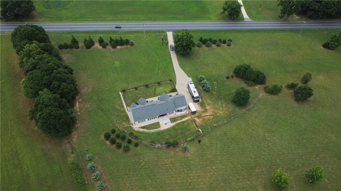 2900 Highway 187 Anderson, SC 29626 - Photo 37 of 41 An aerial perspective reveals a secluded estate featuring a long, private driveway and expansive green acreage.