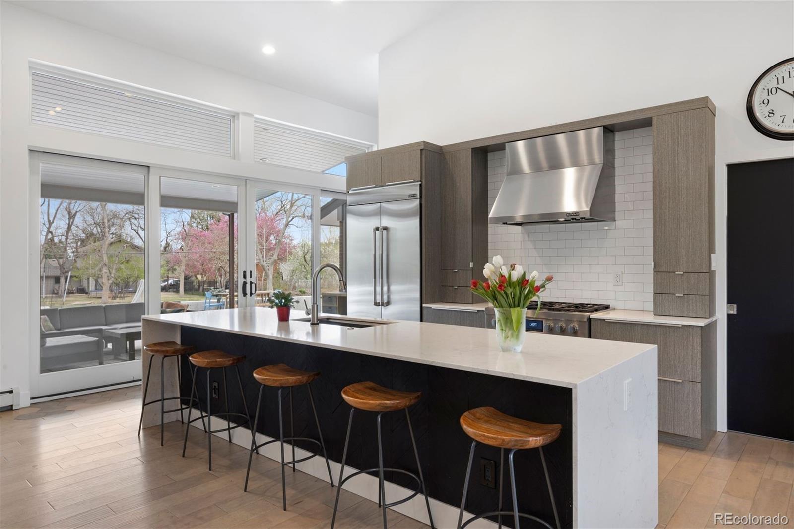 13380 Braun Road Golden, CO 80401 - Photo 13 of 49 a dining hall with stainless steel appliances granite countertop a stove and a refrigerator