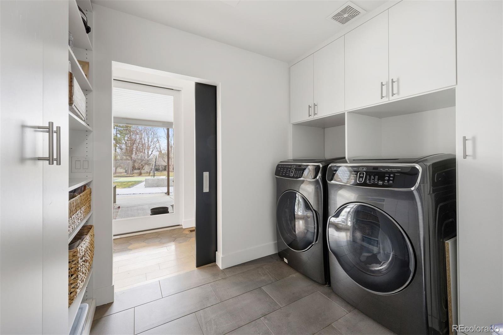 13380 Braun Road Golden, CO 80401 - Photo 16 of 49 a view of a kitchen with washer and dryer