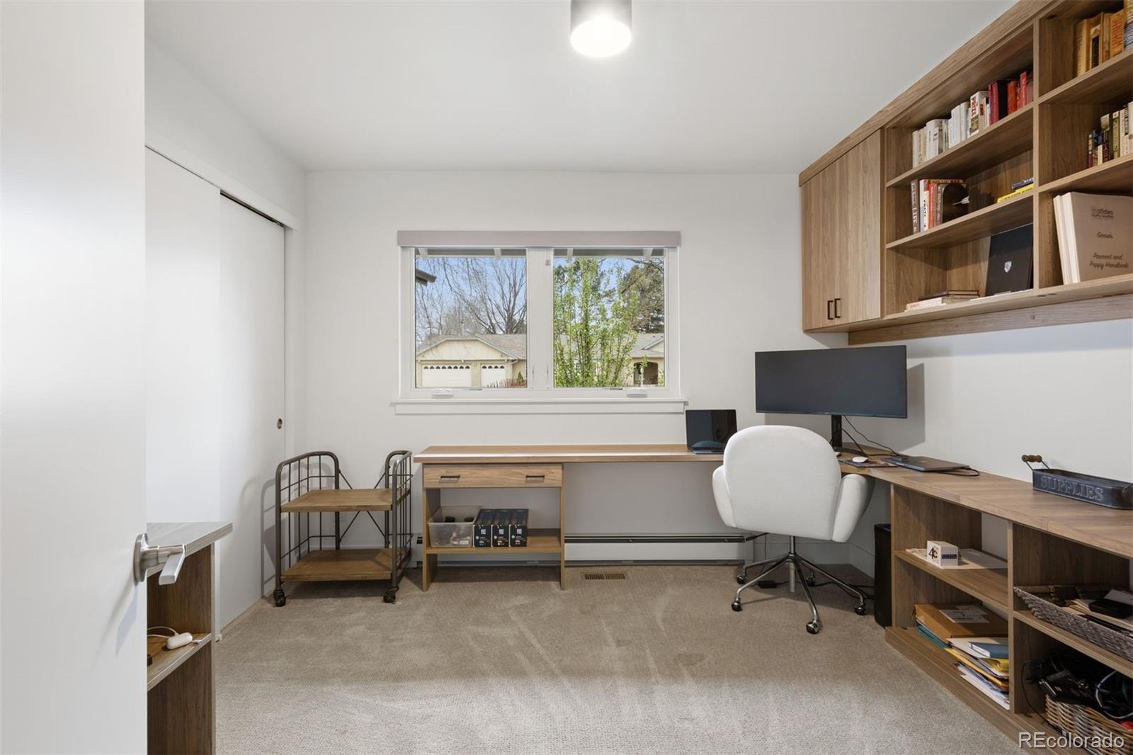 13380 Braun Road Golden, CO 80401 - Photo 20 of 49 a living room with furniture a piano and a window