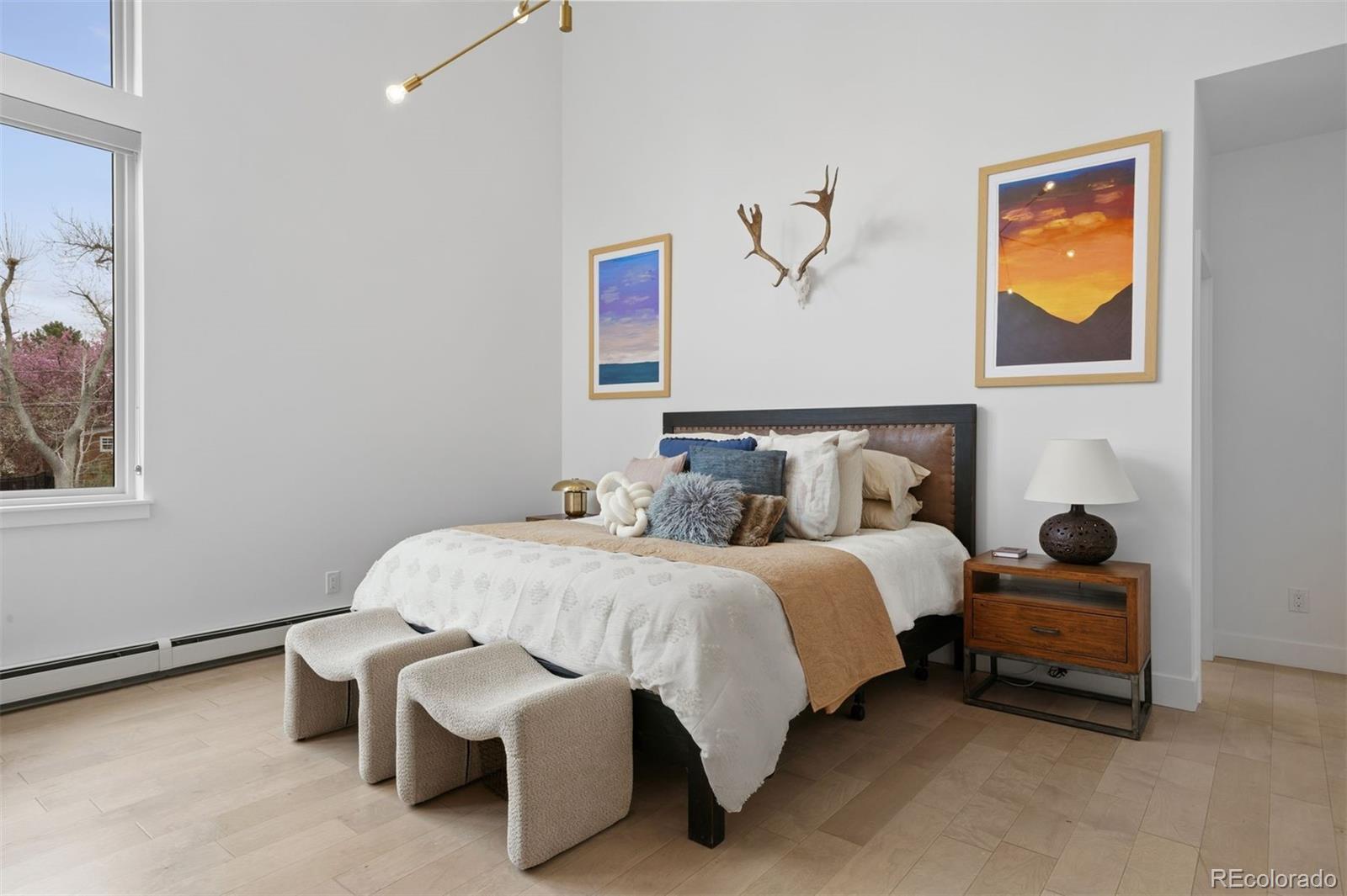 13380 Braun Road Golden, CO 80401 - Photo 21 of 49 a bedroom with bed and window