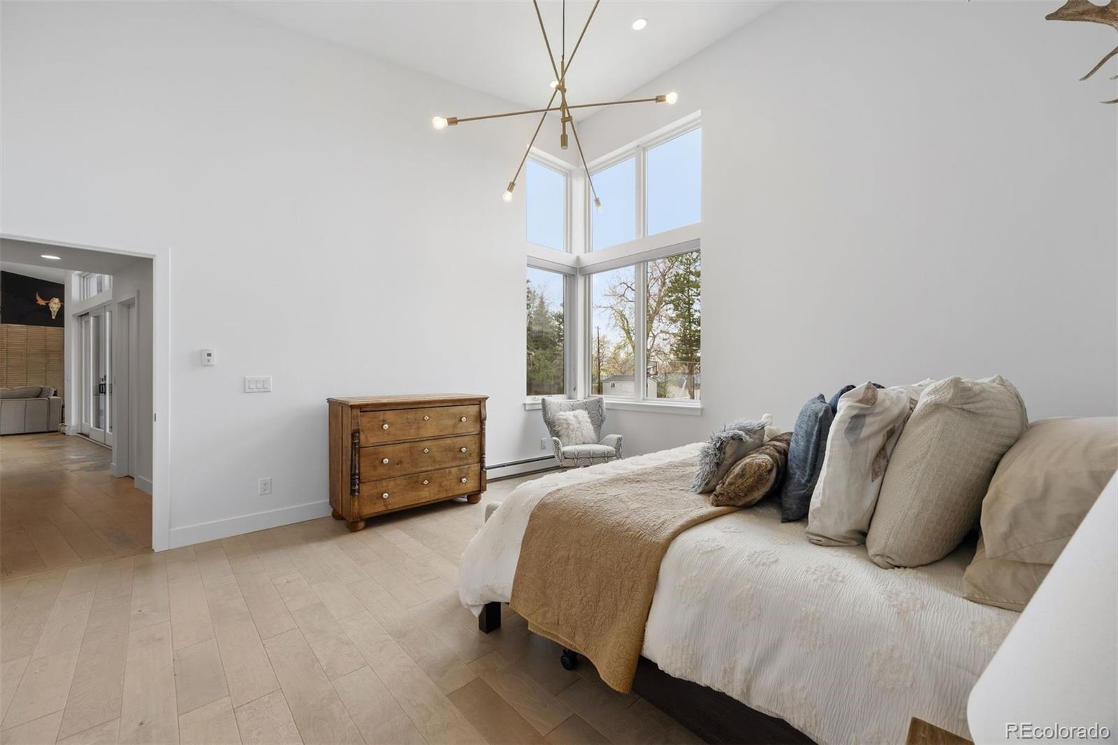 13380 Braun Road Golden, CO 80401 - Photo 22 of 49 a bedroom with a bed a window and closet