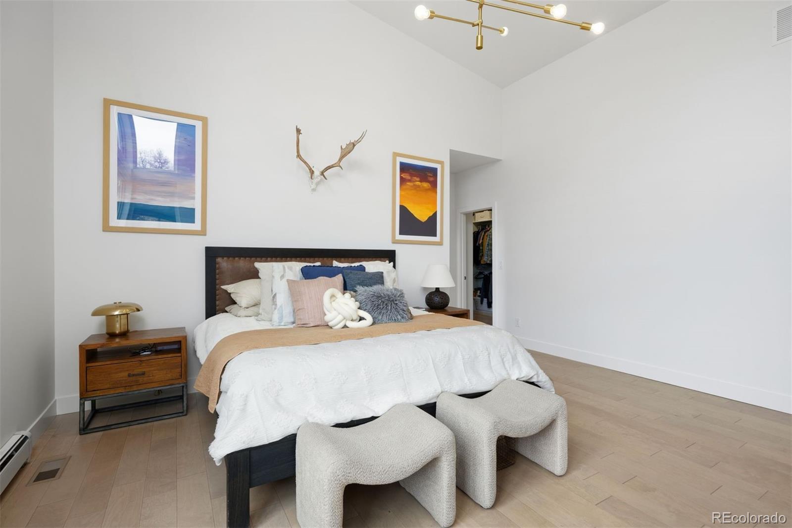 13380 Braun Road Golden, CO 80401 - Photo 23 of 49 a bedroom with a bed and dresser