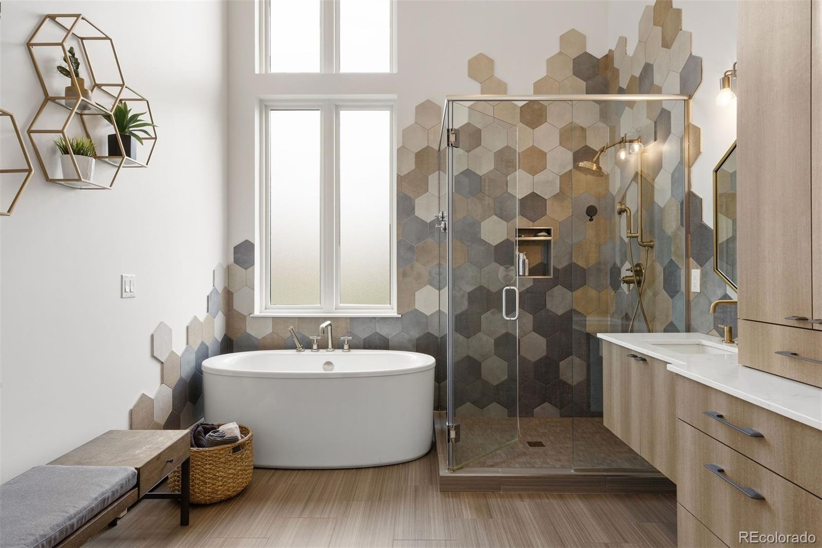 13380 Braun Road Golden, CO 80401 - Photo 24 of 49 a bathroom with a tub sink and mirror