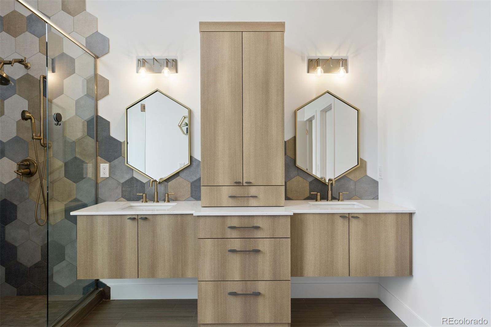 13380 Braun Road Golden, CO 80401 - Photo 25 of 49 a bathroom with a sink vanity and mirror