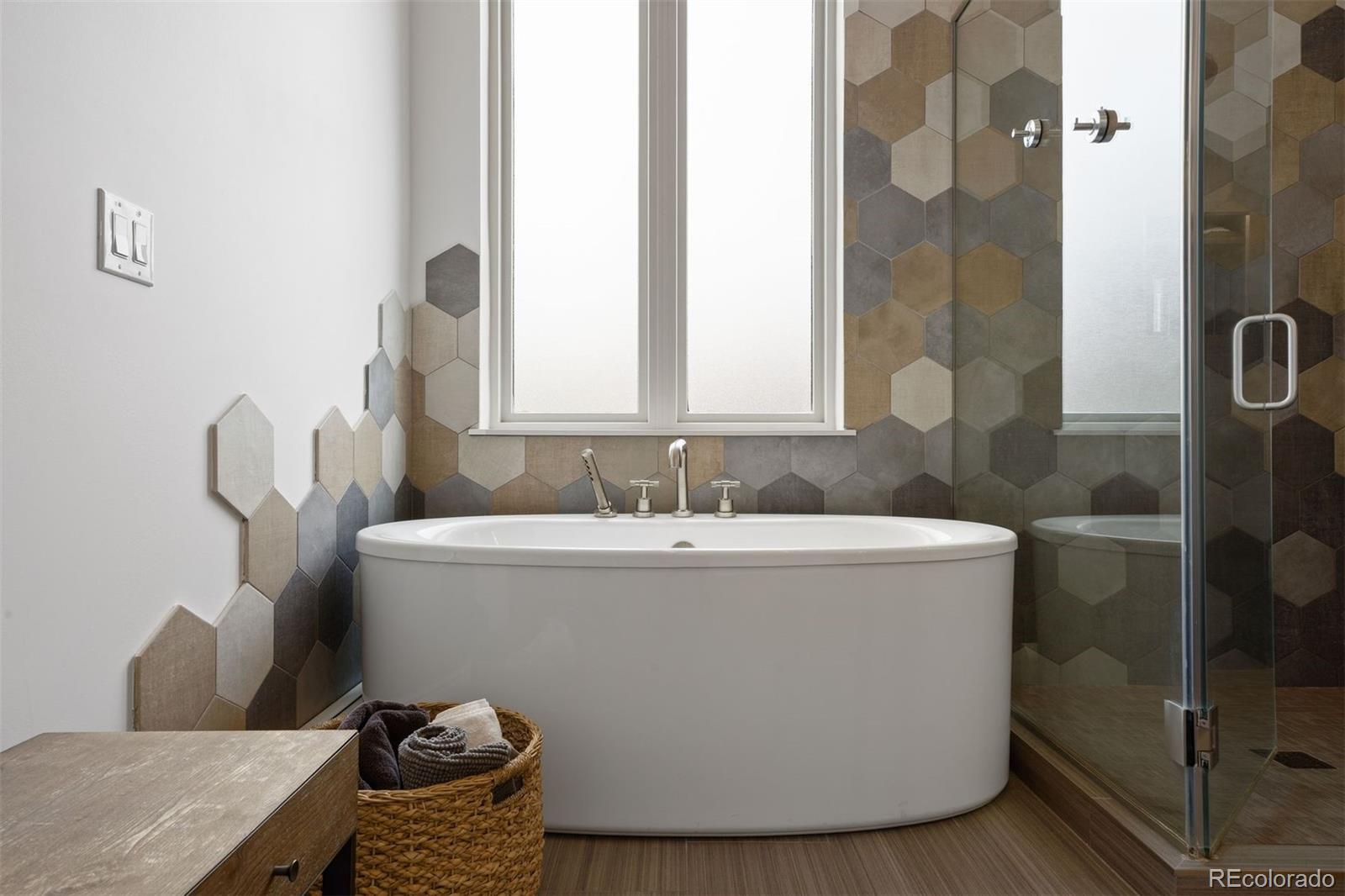 13380 Braun Road Golden, CO 80401 - Photo 26 of 49 a view of bathroom with bathtub and shower