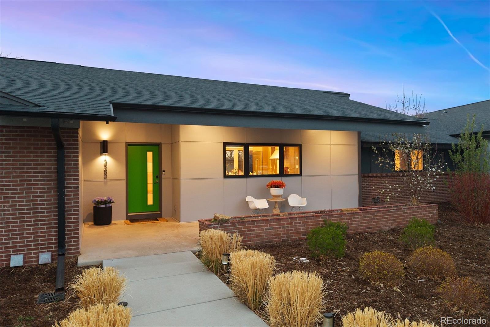 13380 Braun Road Golden, CO 80401 - Photo 3 of 49 a front view of a house with a yard