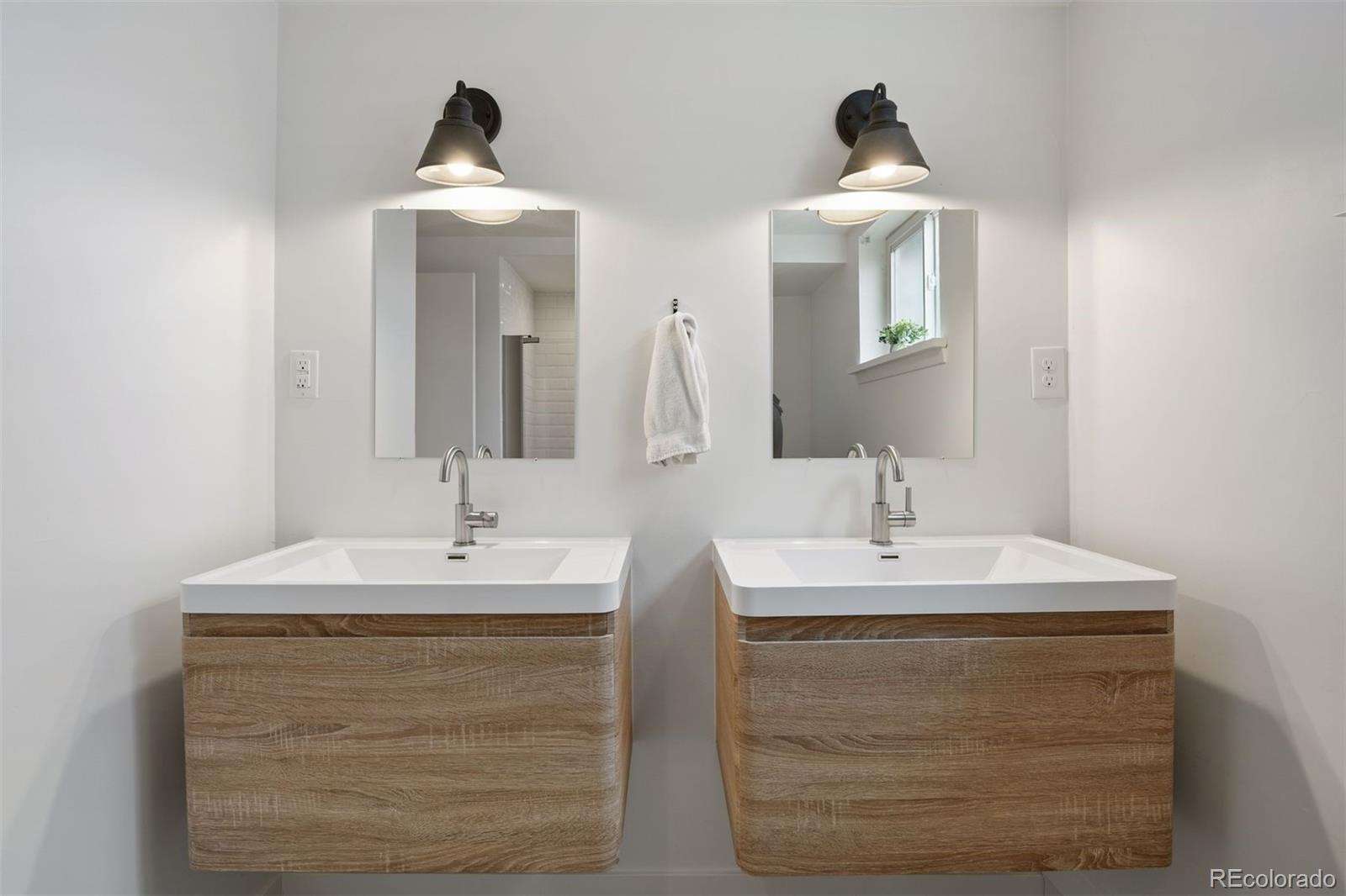 13380 Braun Road Golden, CO 80401 - Photo 34 of 49 a bathroom with a sink and a mirror