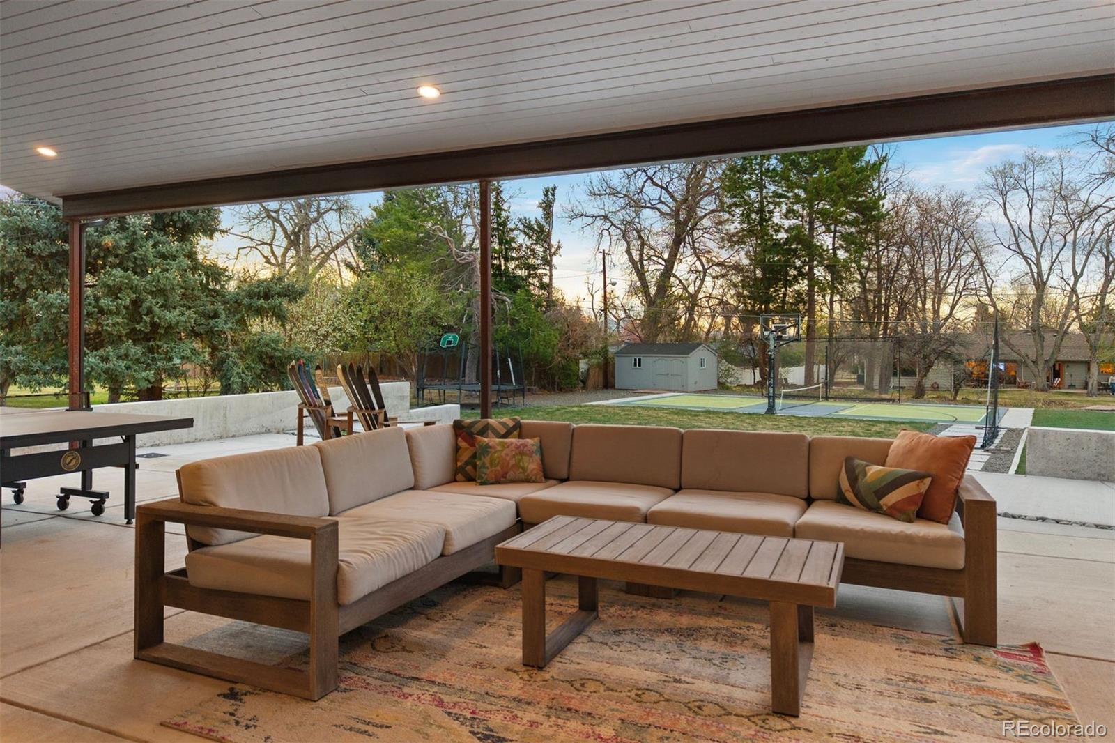 13380 Braun Road Golden, CO 80401 - Photo 37 of 49 a outdoor living space with furniture and a garden