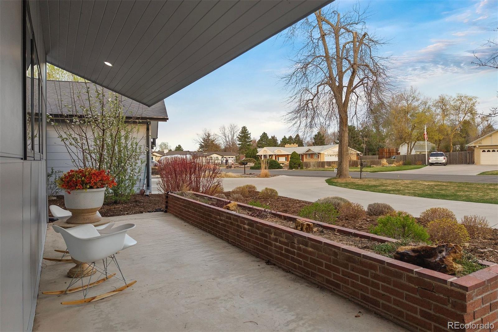 13380 Braun Road Golden, CO 80401 - Photo 4 of 49 a view of a patio with table and chairs and potted plants